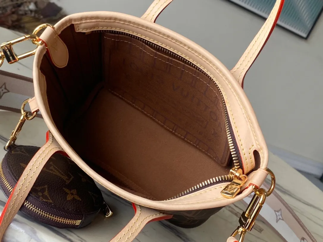 💰880 Top Original Order M46705 Presbyopia This Neverfull BB handbag combines classic design with iconic details. Made from Damier Ebene canvas, lined with colorful fabric and trimmed with cowhide leather, it's roomy without being bulky. Tighten the sides for a trendy look, and stretch them for a casual look. Features a slim, comfortable handle for shoulder or elbow carry. Detachable bag can be used as a clutch or pocket. Detailed features: 24x14x9cm (length x height x width)