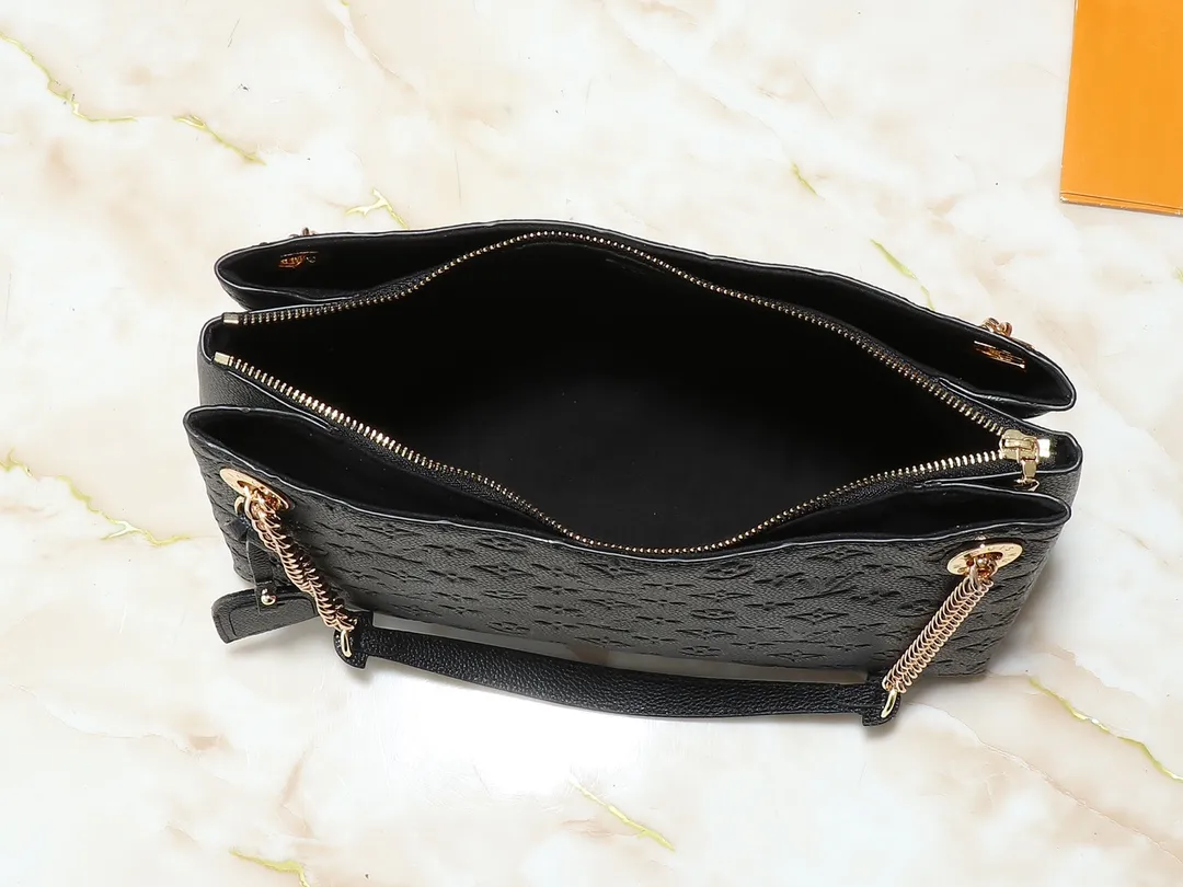 💰300💰Upgraded original M43772.M43759 M43758 This Surene MM Chain Handbag in Letter Empreinte Leather with its gold chain is as functional as it is sophisticated. Very easy to put on thanks to the leather shoulder pads and decorative chain. The large size of this suitcase means it easily fits A4 documents as well as all your daily essentials. The embossed pattern on supple leather is deep enough to stay in place for a while while still maintaining its soft feel. Size: length 37*26*15cm
