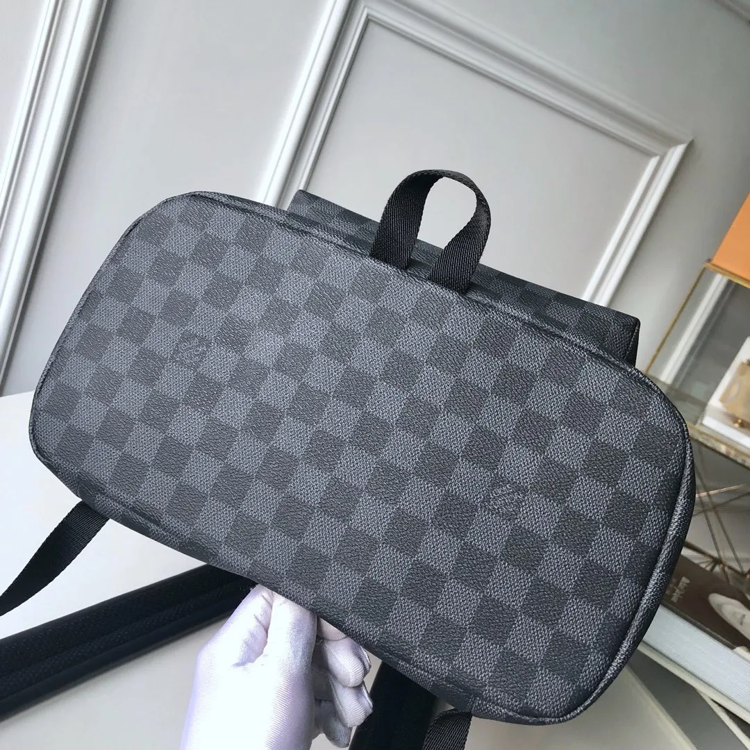 💰1040 Actual photos of the top original item 😍😍 N40005 ZACK Backpack This sports-style coated canvas Zack backpack is full of capacity and shows classic Louis Vuitton style. The flap, drawstring and metal buckle are all classic Louis. Vuitton design elements. - 45 x 30 x 20cm (Length x Height x Width) - Exterior in Louis Vuitton specially coated canvas - Textile lining - Cowhide leather trim - Silver metal hardware - Top handle - 2 leather shoulder straps - Flap + drawstring + buckle - 1 lined interior compartment - 1 double interior patch pocket.