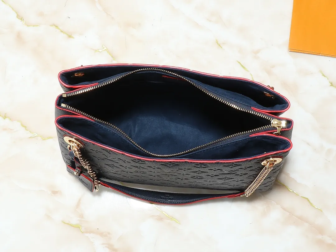 💰300💰Upgraded original M43772.M43759 M43758 This Surene MM Chain Handbag in Letter Empreinte Leather with its gold chain is as functional as it is sophisticated. Very easy to put on thanks to the leather shoulder pads and decorative chain. The large size of this suitcase means it easily fits A4 documents as well as all your daily essentials. The embossed pattern on supple leather is deep enough to stay in place for a while while still maintaining its soft feel. Size: length 37*26*15cm
