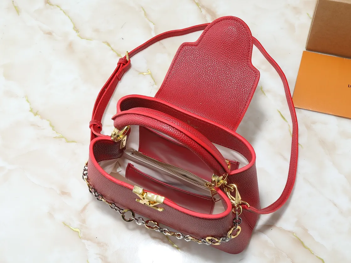 💰400💰Guangzhou goods Upgraded from the original M12935 M12936 M12937 M12938 This Capucines BB handbag is made of flexible Taurillon cow leather, with jewelry-style double-plated chains and Monogram floral elements to highlight the identity of the Chain On You series. The flip cover can be placed on both the inside and outside. The ample structure and multiple inner pockets are convenient for storing daily necessities. The rounded LV letters add to the ingenious details. Dimensions: 27.0 x 17.3 x 9.0 cm (length x height x width)