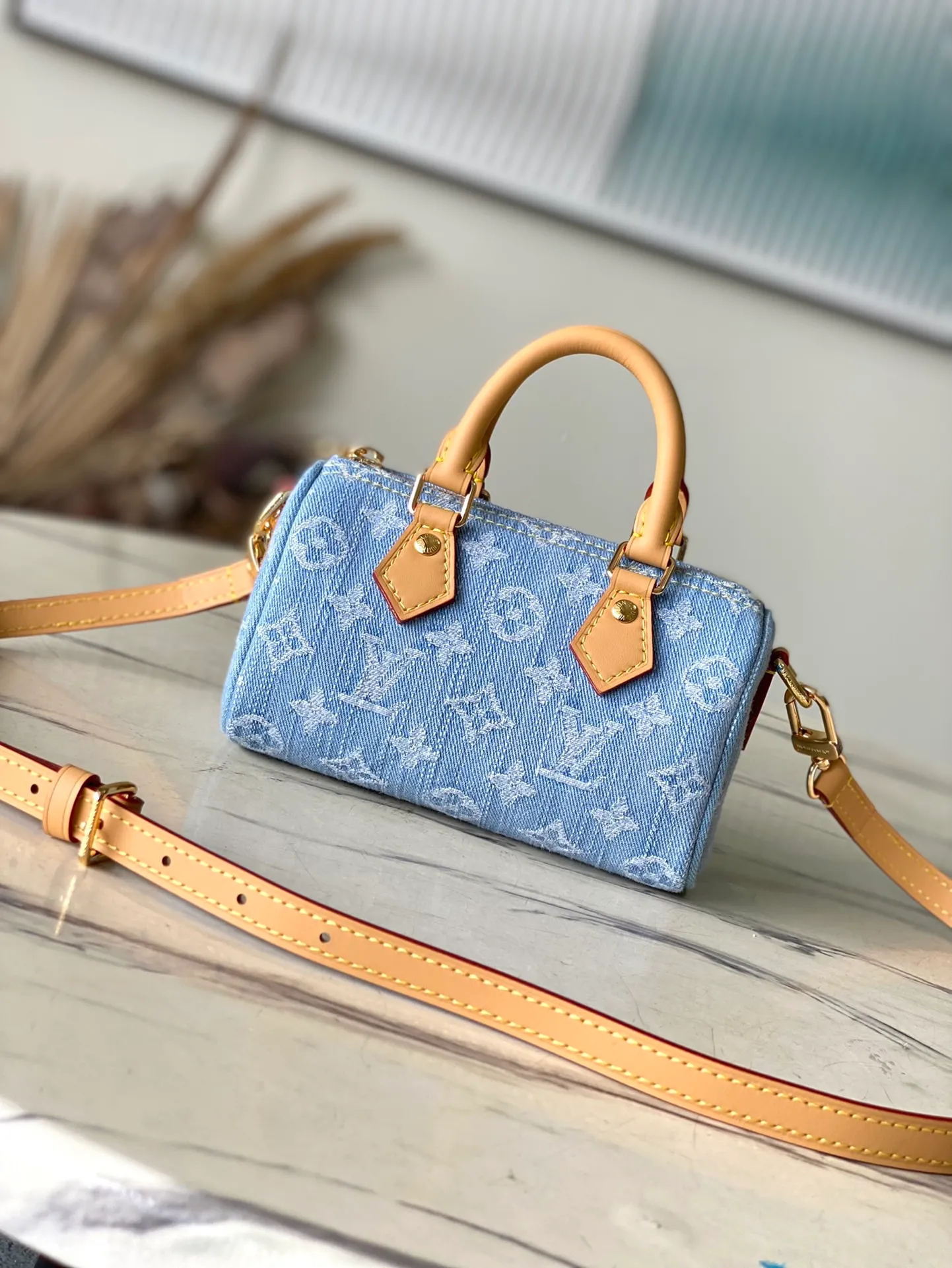 💰740 Top Original Order M11212 This Nano Speedy handbag is made of cotton denim woven with Monogram pattern. It is bleached and sand washed to give it a retro style. The cowhide leather shaped handles and removable and adjustable shoulder strap have a subtly aged effect. Dimensions: 16 × 10 × 7.5 cm