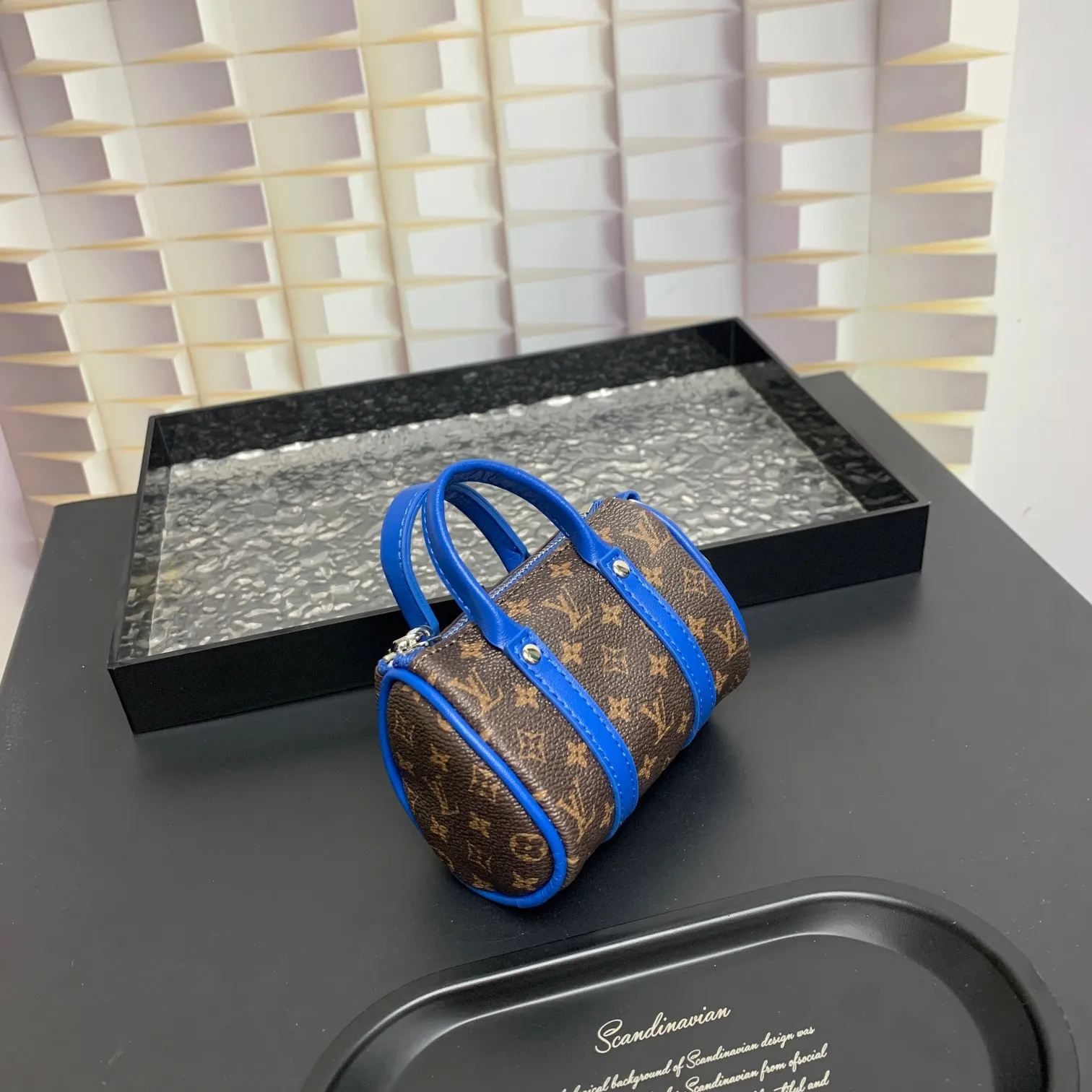 💰200 shipped😍 MINI KEEPALL bag charm and keychain ☀️Louis Vuitton Louis Vuitton lv mini pillow bag pendant ☀️This Mini Keepall bag charm and keychain condenses the classic handbag configuration, boldly showing the spirit of adventure. Monogram canvas with LV inscribed hook buckle, whether hung on a belt or handbag, its zipper closure and built-in keychain ensure secure storage