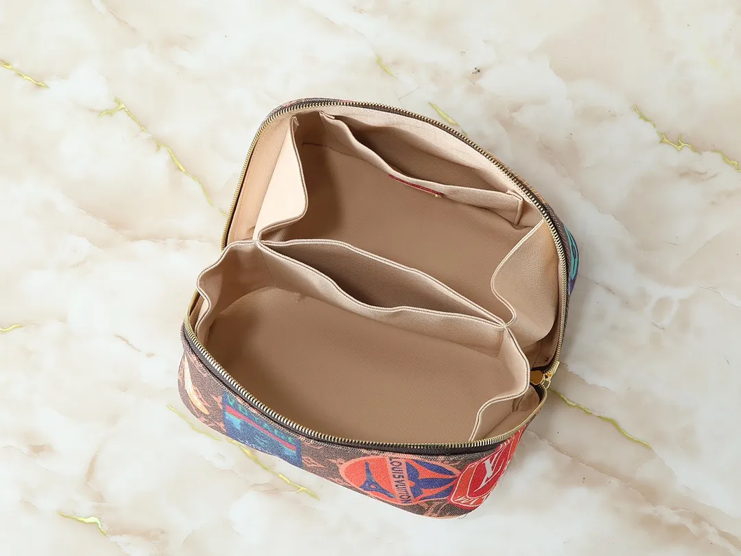 💰220💰Upgraded from the original M14744 M11750 M11508 This 2 Compartments toilet bag is made of Monogram coated canvas with cow leather trim, and uses Louis Vuitton travel stickers to pay tribute to the travel fashion at the turn of the last century. Internal compartments allow for easy storage, and dual zip closures add functionality. Dimensions: 24.0 x 13.0 x 13.0 cm (length x height x width)