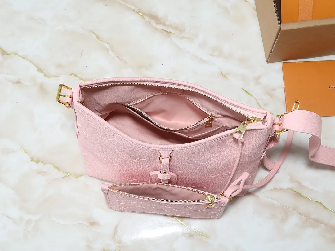💰240💰Upgraded from the original M24141 M46288 M46293 M46277 M46298 M46203 CarryAll small handbag is made of Mono gram Empreinte embossed leather. It has a generous structure and a neat inner layer. The large inner bag adds functional elements. Comes with a Monogram embossed zipper clutch secured by a leather strap. A personal companion for urban life. Dimensions 29 x 24 x 12 cm (length x height x width)