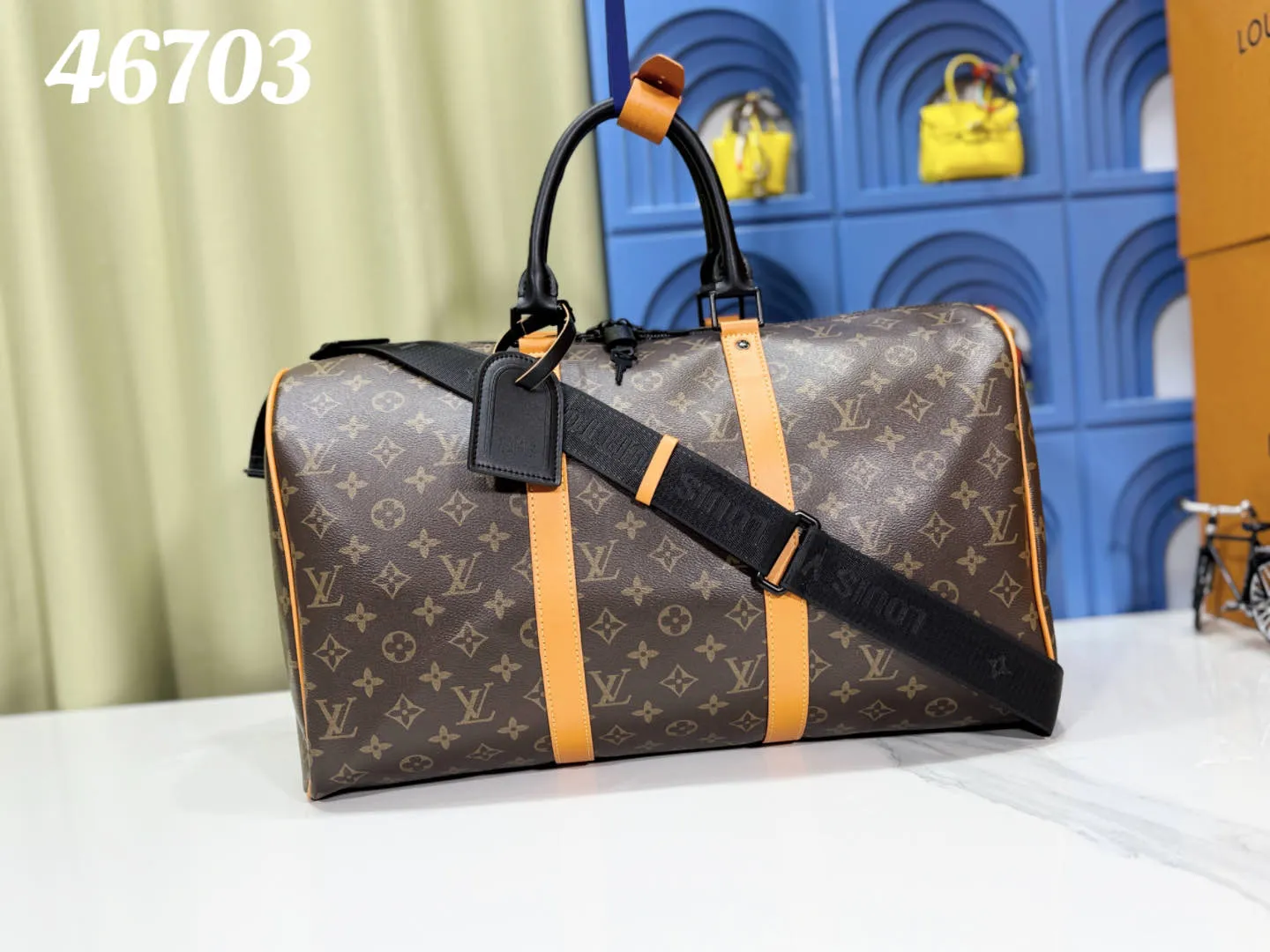 P340 M46703 45cm M46702 55cm Upgraded version This Keepall Bandoulière 45 travel bag introduces classic heritage with Monogram Macassar coated canvas. Side straps are cut out of contrasting leather, leather handles and hardware at the top add a calming touch, and the detachable and adjustable fabric shoulder strap is woven with the Louis Vuitton logo. 45.0 x 27.0 x 20.0 cm (L x H x W) • Monogram Macassar coated canvas • Cow leather trim • Textile lining • Metal hardware • Carry-on dimensions • Double zip closure • Padlock • Internal zip pocket • Removable name tag • Shoulder strap: removable, adjustable • Half-length strap: 36.0 cm • Half-length strap adjustable to: 50.0 cm • Handle: Double handle