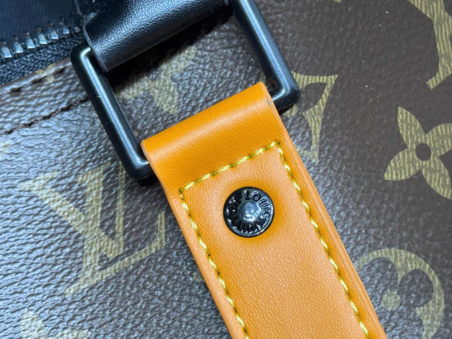 P340 M46703 45cm M46702 55cm Upgraded version This Keepall Bandoulière 45 travel bag introduces classic heritage with Monogram Macassar coated canvas. Side straps are cut out of contrasting leather, leather handles and hardware at the top add a calming touch, and the detachable and adjustable fabric shoulder strap is woven with the Louis Vuitton logo. 45.0 x 27.0 x 20.0 cm (L x H x W) • Monogram Macassar coated canvas • Cow leather trim • Textile lining • Metal hardware • Carry-on dimensions • Double zip closure • Padlock • Internal zip pocket • Removable name tag • Shoulder strap: removable, adjustable • Half-length strap: 36.0 cm • Half-length strap adjustable to: 50.0 cm • Handle: Double handle