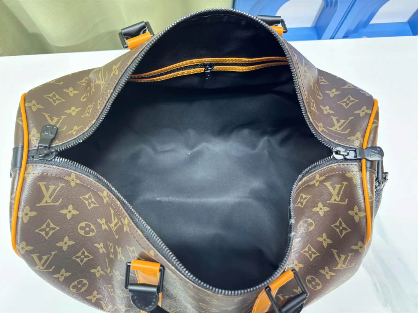 P340 M46703 45cm M46702 55cm Upgraded version This Keepall Bandoulière 45 travel bag introduces classic heritage with Monogram Macassar coated canvas. Side straps are cut out of contrasting leather, leather handles and hardware at the top add a calming touch, and the detachable and adjustable fabric shoulder strap is woven with the Louis Vuitton logo. 45.0 x 27.0 x 20.0 cm (L x H x W) • Monogram Macassar coated canvas • Cow leather trim • Textile lining • Metal hardware • Carry-on dimensions • Double zip closure • Padlock • Internal zip pocket • Removable name tag • Shoulder strap: removable, adjustable • Half-length strap: 36.0 cm • Half-length strap adjustable to: 50.0 cm • Handle: Double handle