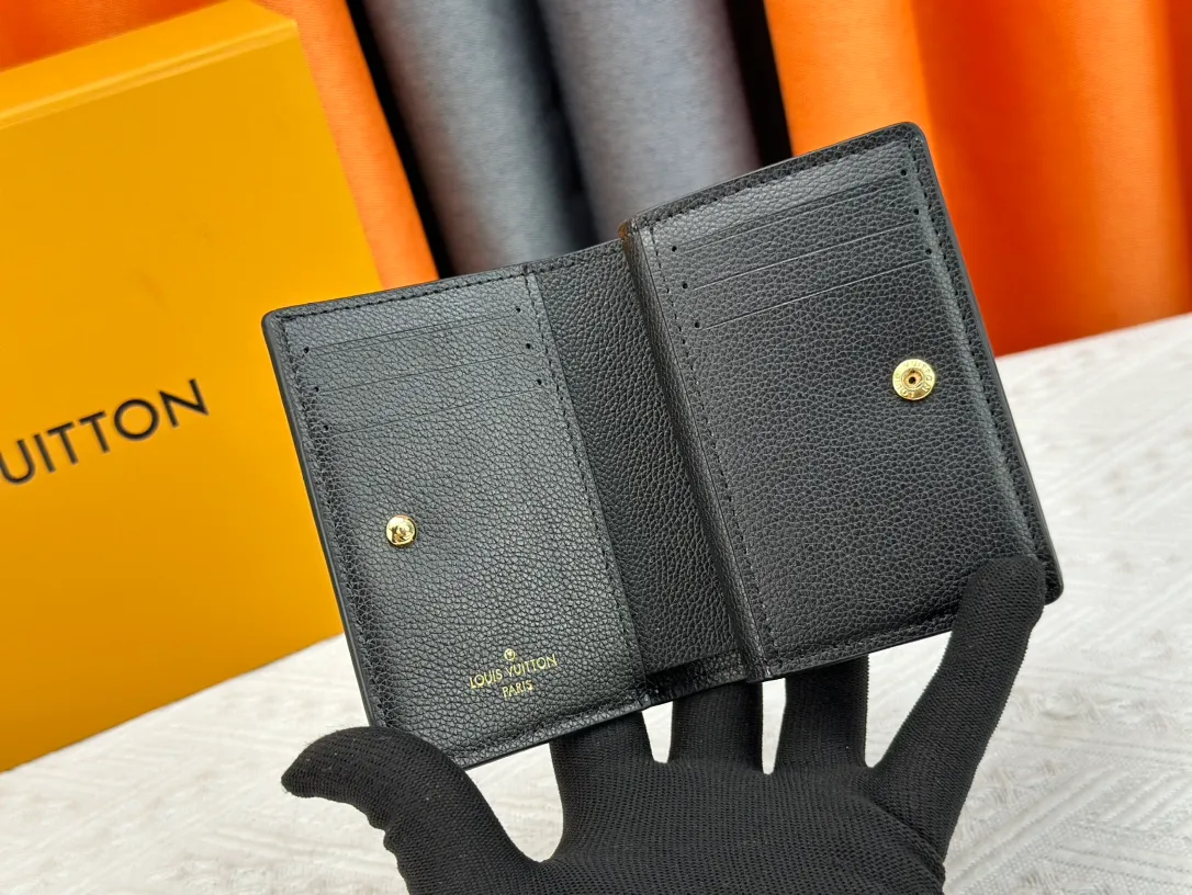 P170LV top replica M80152 This Cléa wallet is made of Monogram Empreinte soft grained cowhide, embellished with Louis Vuitton's iconic Monogram embossed pattern. It has a stylish design, is exquisite and compact but has a spacious capacity. It is equipped with an external patch pocket, zipper coin pocket, banknote compartment and six credit card slots. Dimensions: 12 x 9 x 3.5 cm (length x height x width