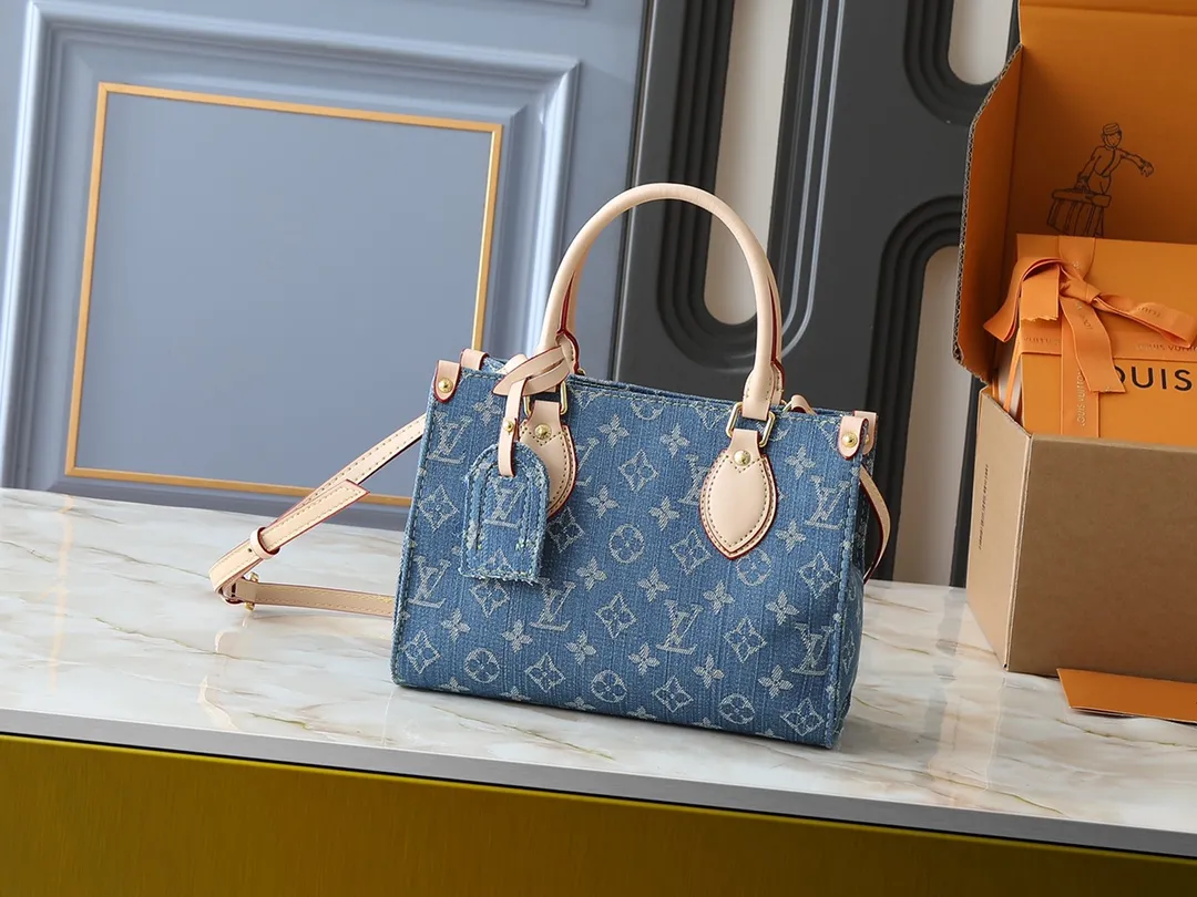 💰260💰Upgraded original M14633 M46373 blue denim denim square bag This OnTheGo small handbag is made of cotton denim woven with Monogram pattern. It is bleached and sand washed to present a retro style. Detachable and Adjustable Shoulder Strap for a Subtle Fit The detachable shoulder strap makes it easy to carry small items like an iPad Mini with you. Detailed features 25x 19 x 11.5 cm.