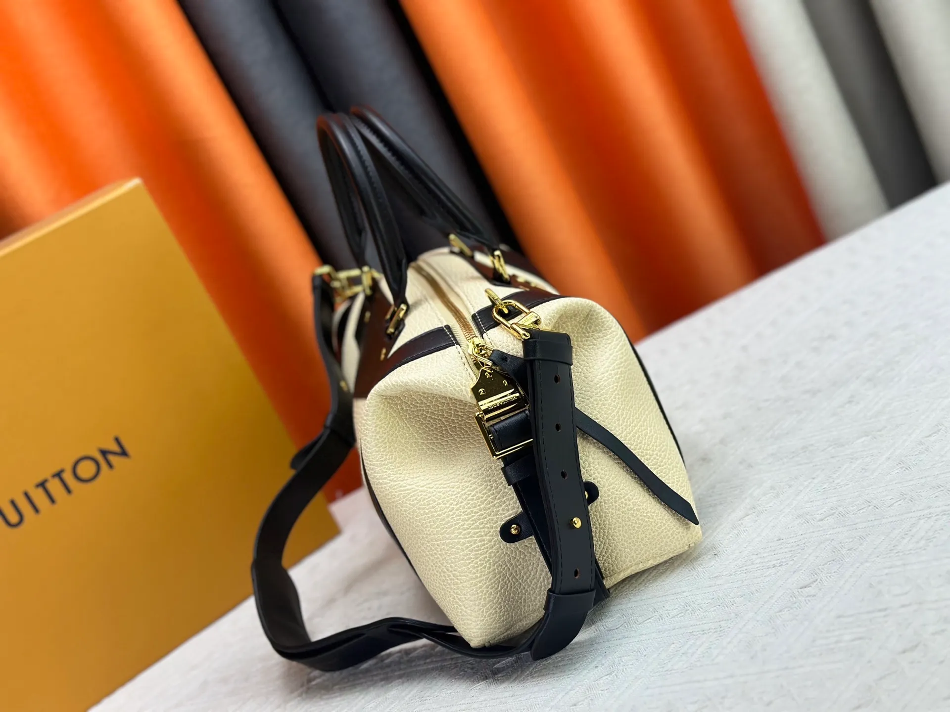 P300 small P320 medium P340 large M25557 M25561 M25561 M25566 Black M14623 mini M14514 small M14700 medium Dark gray M14702 medium Light gray M14721 small This Nano LV Rider handbag is from 2025 For the spring and summer series, pixelated grained sheep leather is blended with smooth cow leather elements, and the LV Circle logo is highlighted with elegant patches. The foldable configuration makes it easy to store in a suitcase, and the modern design adds a rock-n-roll edge to any look.  Mini 10 x 10 x 23 cm Small 12 × 12 × 30 cm Medium 15 × 15 × 38 cm (H x W x L) Sheep leather Cow leather trim Textile lining Metal hardware Zipper closure Side slip straps Internal pocket Holds a 6.7-inch smartphone, Romy card holder and lipstick Shoulder strap: removable, adjustable Strap half-length: 30.0 cm Bag strap half length adjustable to: 45.0 cm Handle: double handle