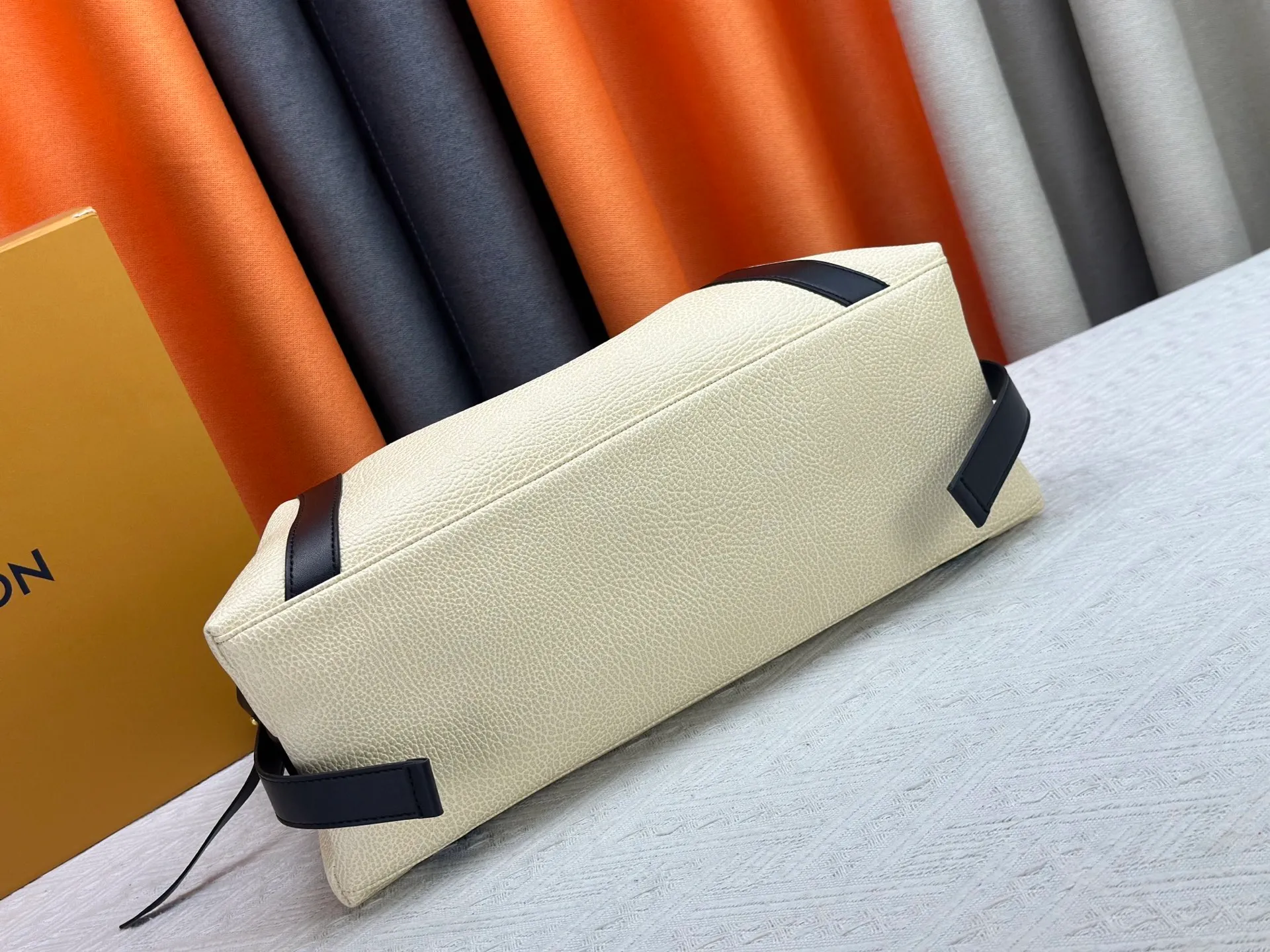 P300 small P320 medium P340 large M25557 M25561 M25561 M25566 Black M14623 mini M14514 small M14700 medium Dark gray M14702 medium Light gray M14721 small This Nano LV Rider handbag is from 2025 For the spring and summer series, pixelated grained sheep leather is blended with smooth cow leather elements, and the LV Circle logo is highlighted with elegant patches. The foldable configuration makes it easy to store in a suitcase, and the modern design adds a rock-n-roll edge to any look.  Mini 10 x 10 x 23 cm Small 12 × 12 × 30 cm Medium 15 × 15 × 38 cm (H x W x L) Sheep leather Cow leather trim Textile lining Metal hardware Zipper closure Side slip straps Internal pocket Holds a 6.7-inch smartphone, Romy card holder and lipstick Shoulder strap: removable, adjustable Strap half-length: 30.0 cm Bag strap half length adjustable to: 45.0 cm Handle: double handle