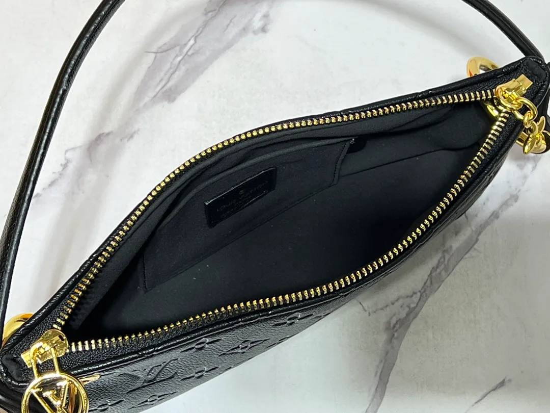 Batch 220💰Upgraded original M12174 This Pochette Sèvres belongs to the LV ski collection and is ready to shine in a "shiny" gun metal tone. It's crafted from signature Monogram Empreinte leather with pale gold hardware for an elegant contrast. The double zip closure features two pendants, one depicting an LV ring and the other displaying a crystal-embellished Monogram flower. Think of it as the perfect après-ski bag. Dimensions: 25 x 13 x 5 cm (length x height x width)