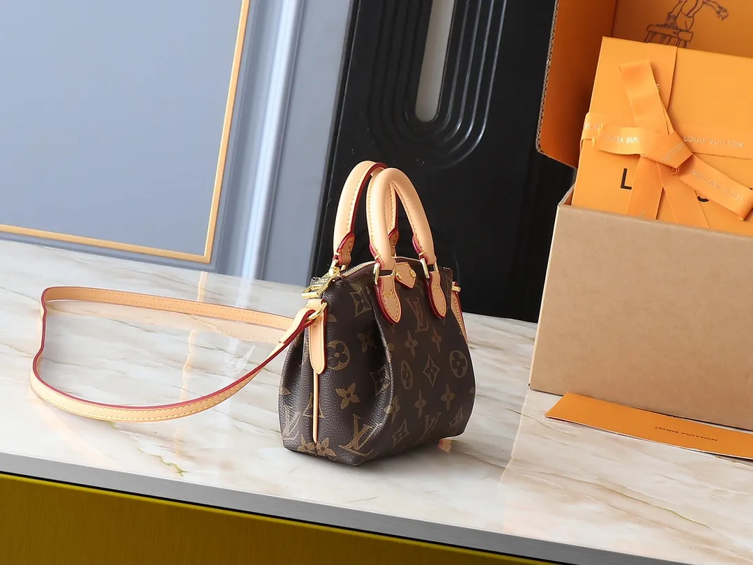 💰180💰Upgraded original M61253 NANO TURENNE The Nano Turenne handbag made of classic Monogram canvas exudes the ultimate femininity and is ideal for carrying your daily necessities. This handbag is the perfect mini version of the original Turenne handbag. It has exquisite stitching and is extremely light. It can easily accommodate your smartphone, credit card and keys. Size 17x 11x 6cm