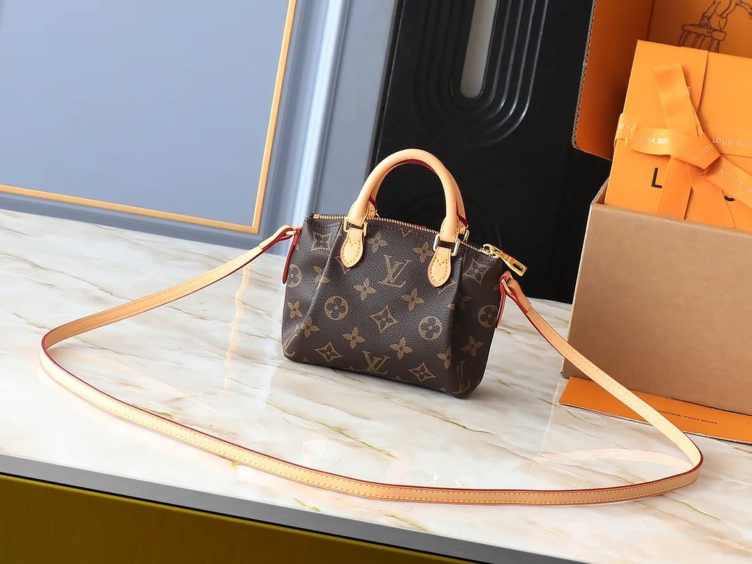 💰180💰Upgraded original M61253 NANO TURENNE The Nano Turenne handbag made of classic Monogram canvas exudes the ultimate femininity and is ideal for carrying your daily necessities. This handbag is the perfect mini version of the original Turenne handbag. It has exquisite stitching and is extremely light. It can easily accommodate your smartphone, credit card and keys. Size 17x 11x 6cm