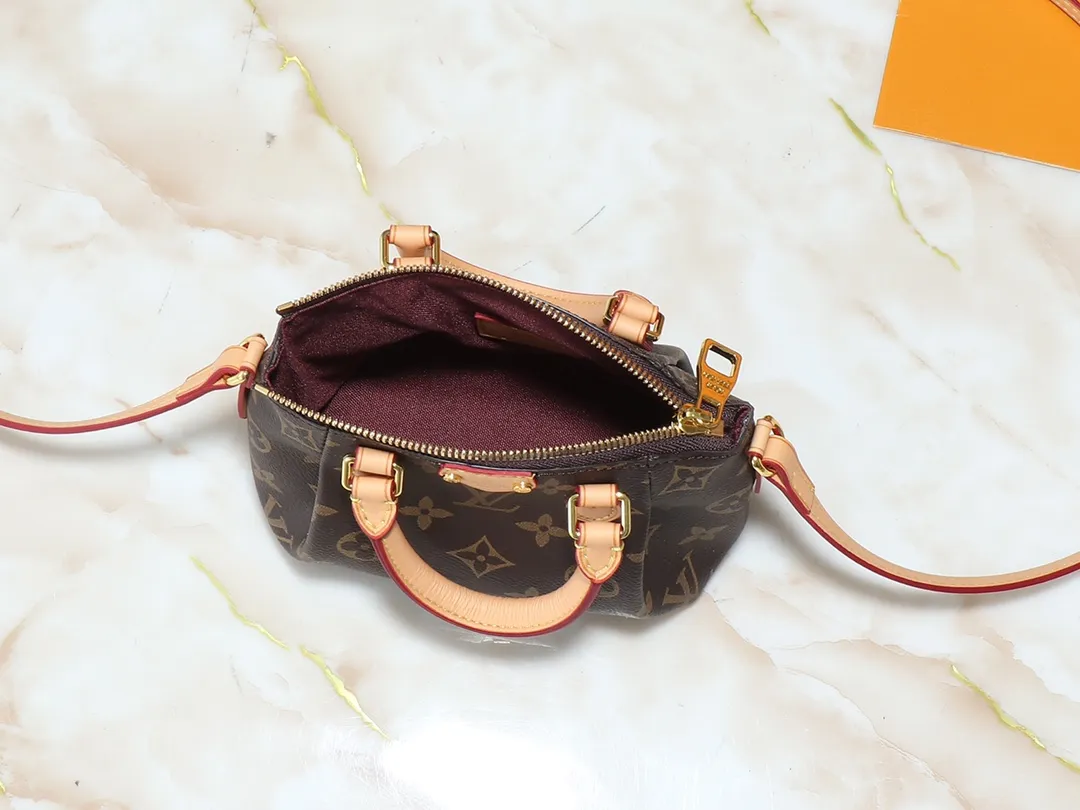 💰180💰Upgraded original M61253 NANO TURENNE The Nano Turenne handbag made of classic Monogram canvas exudes the ultimate femininity and is ideal for carrying your daily necessities. This handbag is the perfect mini version of the original Turenne handbag. It has exquisite stitching and is extremely light. It can easily accommodate your smartphone, credit card and keys. Size 17x 11x 6cm