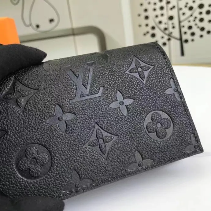 P150M80152 This Cléa wallet is made of Monogram Empreinte soft grained cowhide, embellished with Louis Vuitton's iconic Monogram embossed pattern. It has a stylish design, is exquisite and compact but has a spacious capacity. It is equipped with an external patch pocket, zipper coin pocket, banknote compartment and six credit card slots. Dimensions: 12 x 9 x 3.5 cm (length x height x width