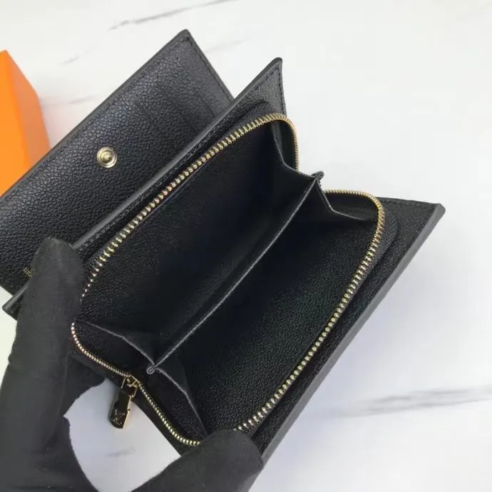 P150M80152 This Cléa wallet is made of Monogram Empreinte soft grained cowhide, embellished with Louis Vuitton's iconic Monogram embossed pattern. It has a stylish design, is exquisite and compact but has a spacious capacity. It is equipped with an external patch pocket, zipper coin pocket, banknote compartment and six credit card slots. Dimensions: 12 x 9 x 3.5 cm (length x height x width