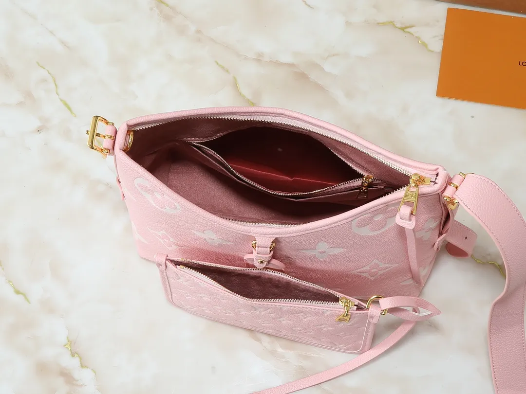 💰240💰Upgraded from the original M24141 M46288 M46293 M46277 M46298 M46203 CarryAll small handbag is made of Mono gram Empreinte embossed leather. It has a generous structure and a neat inner layer. The large inner bag adds functional elements. Comes with a Monogram embossed zipper clutch secured by a leather strap. A personal companion for urban life. Dimensions 29 x 24 x 12 cm (length x height x width)
