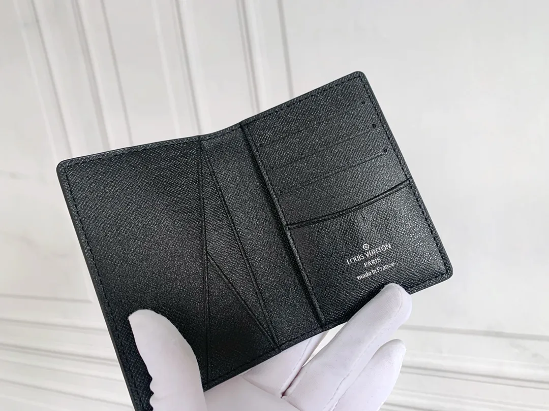 💰80 💎Small card holder Louis vuitton's pocket leather wallet has seven compartments, which can hold credit cards, bus cards, business cards, and even city maps. Damier canvas, leather-bound - two credit card compartments - four inner compartments - one outer compartment. ❤️ Model M63144 Size 7X11.
