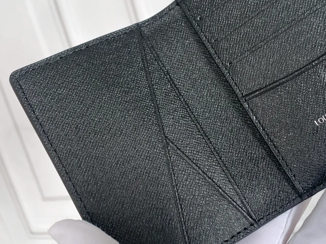 💰80 💎Small card holder Louis vuitton's pocket leather wallet has seven compartments, which can hold credit cards, bus cards, business cards, and even city maps. Damier canvas, leather-bound - two credit card compartments - four inner compartments - one outer compartment. ❤️ Model M63144 Size 7X11.