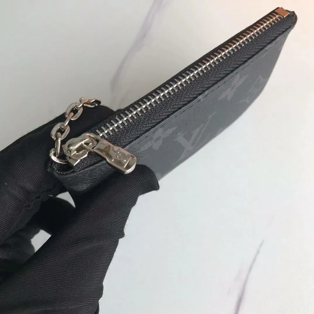 💰90💰This Damier canvas small leather bag can hold change and keys, and can be easily put into a handbag or clothing pocket. Key ring, key hook can be hung on the D-ring provided with most Louis Vuitton handbags, zipper closure, Damier canvas texture and embossed calfskin, shiny gold-tone hardware. 👏👏Model 62650, size: 12x7cm,