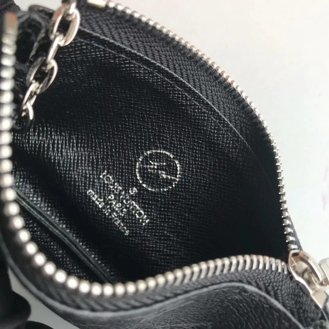 💰90💰This Damier canvas small leather bag can hold change and keys, and can be easily put into a handbag or clothing pocket. Key ring, key hook can be hung on the D-ring provided with most Louis Vuitton handbags, zipper closure, Damier canvas texture and embossed calfskin, shiny gold-tone hardware. 👏👏Model 62650, size: 12x7cm,