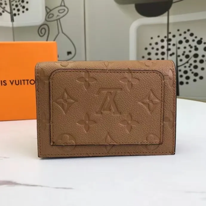 P150M80152 This Cléa wallet is made of Monogram Empreinte soft grained cowhide, embellished with Louis Vuitton's iconic Monogram embossed pattern. It has a stylish design, is exquisite and compact but has a spacious capacity. It is equipped with an external patch pocket, zipper coin pocket, banknote compartment and six credit card slots. Dimensions: 12 x 9 x 3.5 cm (length x height x width