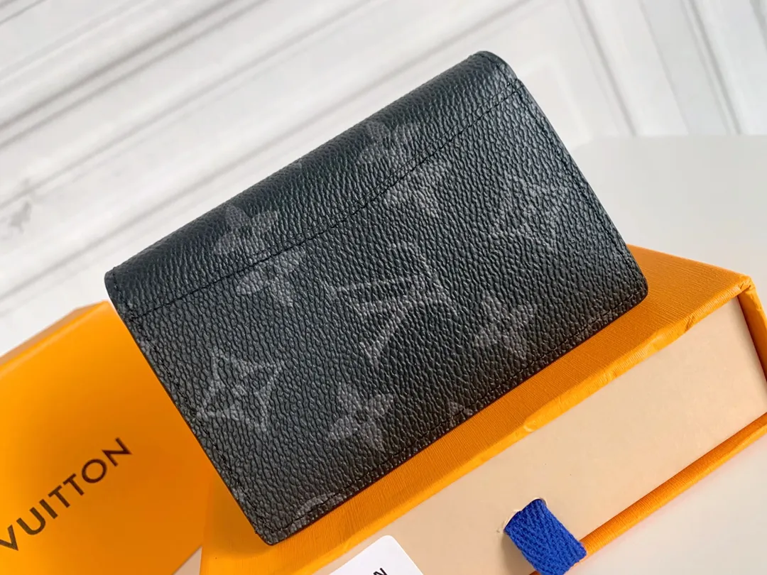 💰80 💎Small card holder Louis vuitton's pocket leather wallet has seven compartments, which can hold credit cards, bus cards, business cards, and even city maps. Damier canvas, leather-bound - two credit card compartments - four inner compartments - one outer compartment. ❤️ Model M63144 Size 7X11.