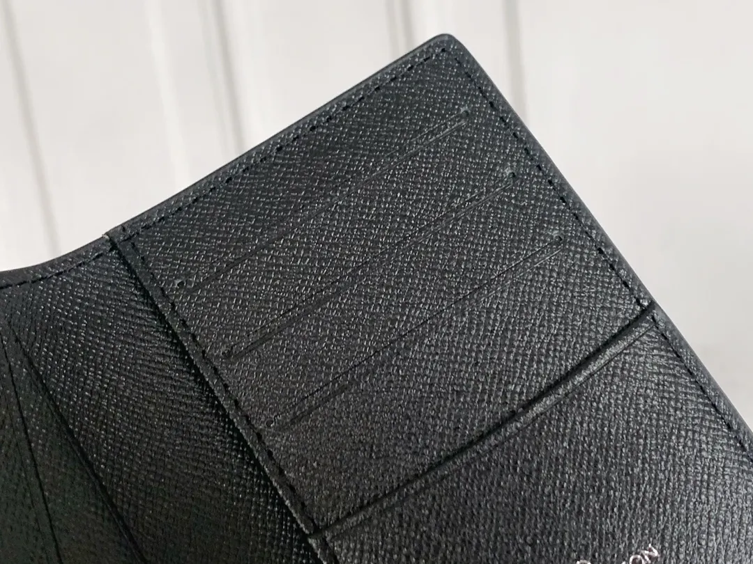 💰80 💎Small card holder Louis vuitton's pocket leather wallet has seven compartments, which can hold credit cards, bus cards, business cards, and even city maps. Damier canvas, leather-bound - two credit card compartments - four inner compartments - one outer compartment. ❤️ Model M63144 Size 7X11.