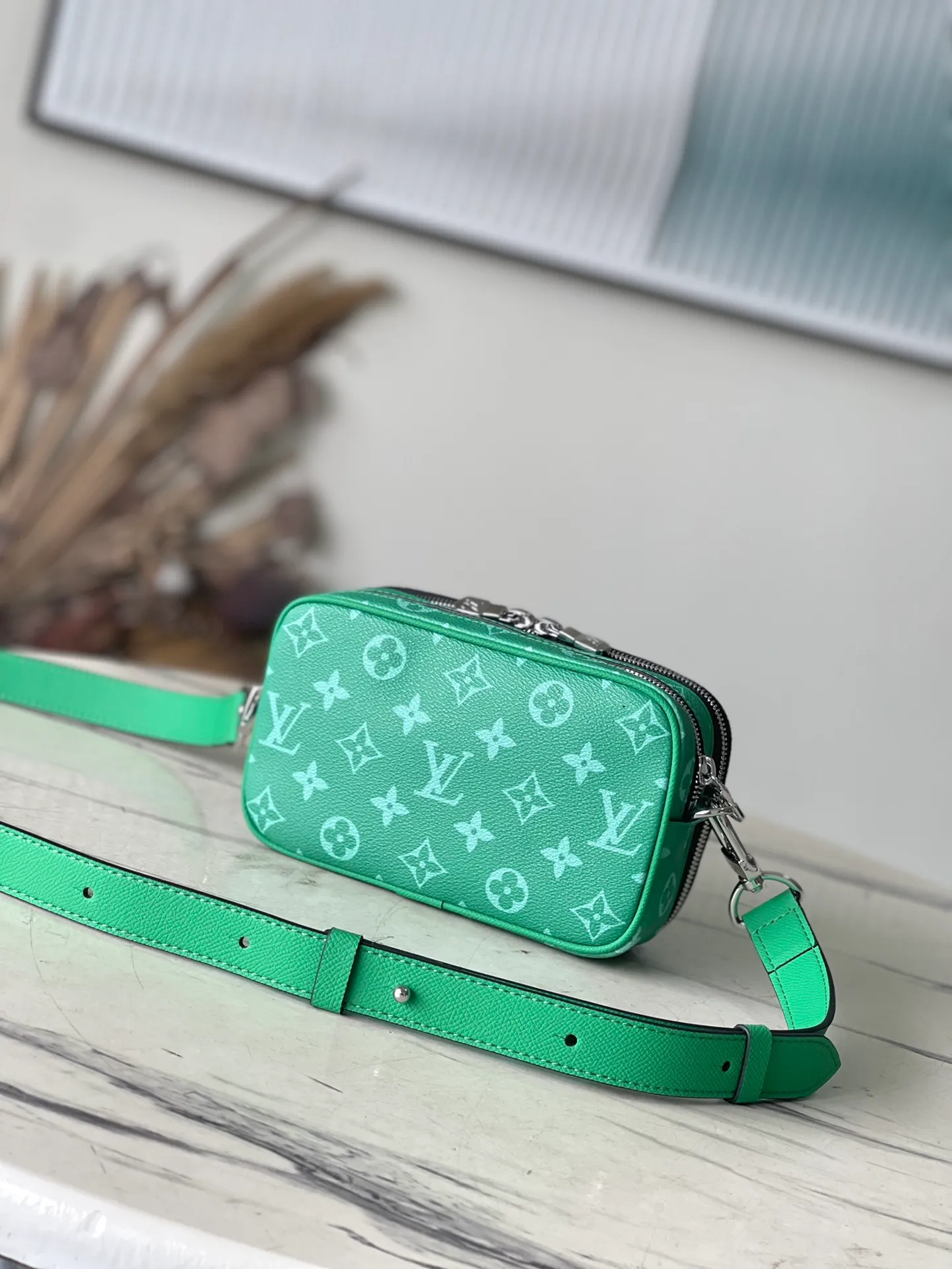 💰940 Top Original Order M30997 Green This Nano Alpha handbag is from the Taigarama series, and is dyed with Taiga embossed leather and Monogram canvas in new summer colors. Adjustable shoulder strap allows for flexible carrying. Dimensions: 11 × 18.5 × 6.5 cm