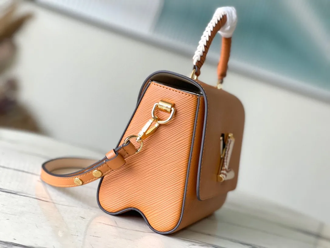 💰1360 (top layer leather) top quality original M22229 brown (woven) This Twist medium handbag is made of Epi embossed leather, and the LV Twist twist lock and top handle are wrapped in woven leather, injecting a feminine touch into the eye-catching structure. With the detachable and adjustable shoulder strap, you can switch between long and short shoulder or cross-body wear. Dimensions: 23.0 x 17.0 x 9.5 cm