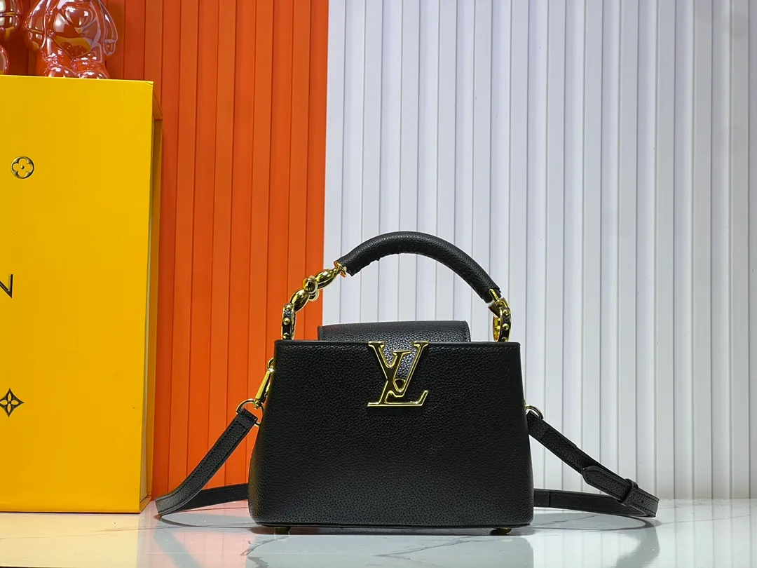 Batch 360💰Upgraded original M23943 M23944 M23945 M24698 M24989 This Capucines mini handbag incorporates exquisite Monogram flowers on the handle, presenting the three-dimensional look of the LV logo with delicate brushstrokes, injecting dazzling luster into the soft design. Full-grain Taurillon leather is designed to fit a smartphone, short wallet and other small essentials. Dimensions: Small 21.0 x 14.0 x 8.0 cm (L x H x W) Large 27x 17.5 x 9.0 cm (L x H x W)