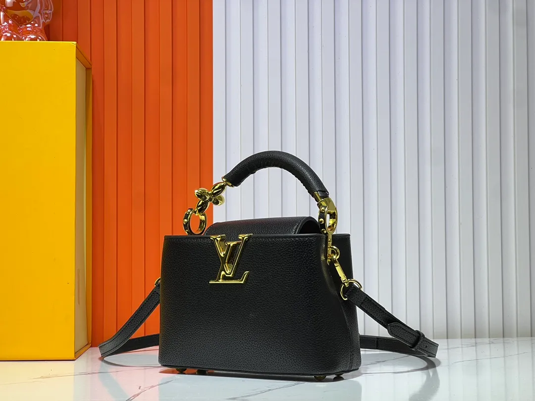 Batch 360💰Upgraded original M23943 M23944 M23945 M24698 M24989 This Capucines mini handbag incorporates exquisite Monogram flowers on the handle, presenting the three-dimensional look of the LV logo with delicate brushstrokes, injecting dazzling luster into the soft design. Full-grain Taurillon leather is designed to fit a smartphone, short wallet and other small essentials. Dimensions: Small 21.0 x 14.0 x 8.0 cm (L x H x W) Large 27x 17.5 x 9.0 cm (L x H x W)