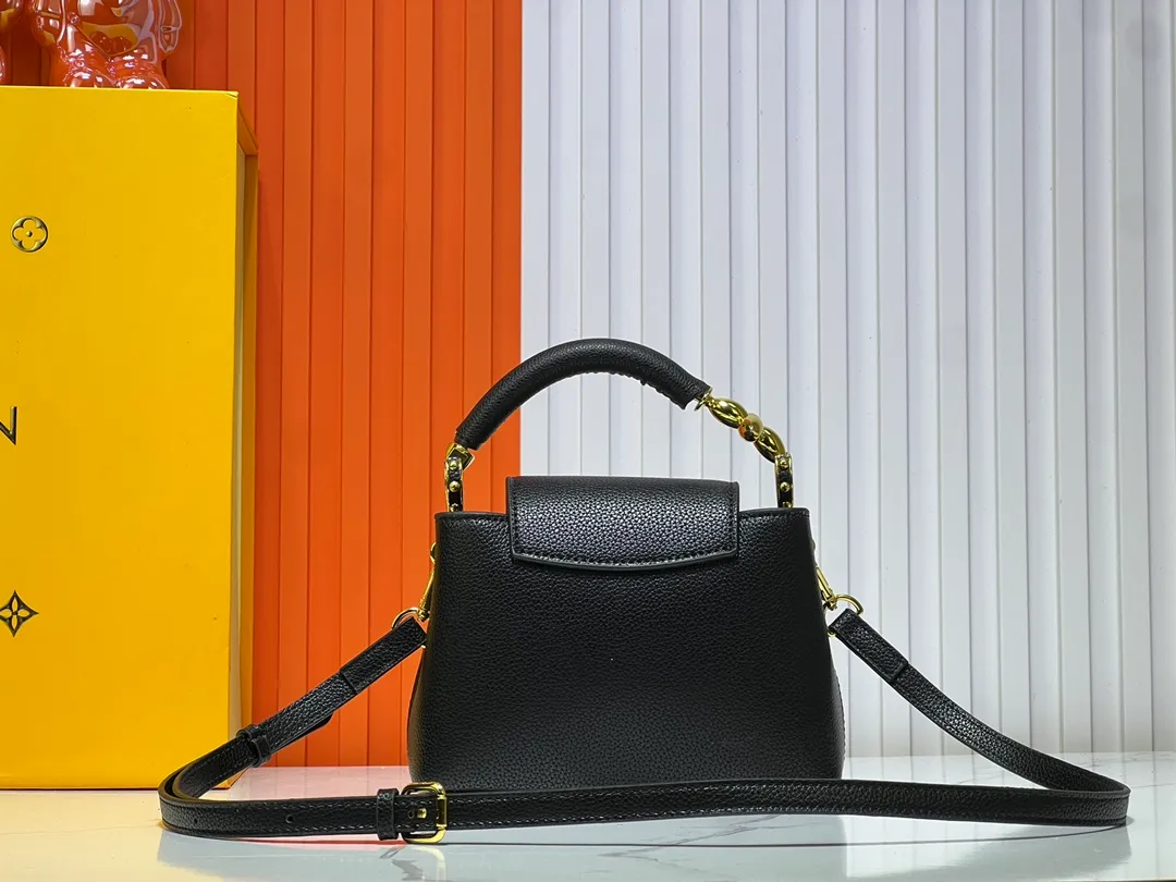 Batch 360💰Upgraded original M23943 M23944 M23945 M24698 M24989 This Capucines mini handbag incorporates exquisite Monogram flowers on the handle, presenting the three-dimensional look of the LV logo with delicate brushstrokes, injecting dazzling luster into the soft design. Full-grain Taurillon leather is designed to fit a smartphone, short wallet and other small essentials. Dimensions: Small 21.0 x 14.0 x 8.0 cm (L x H x W) Large 27x 17.5 x 9.0 cm (L x H x W)