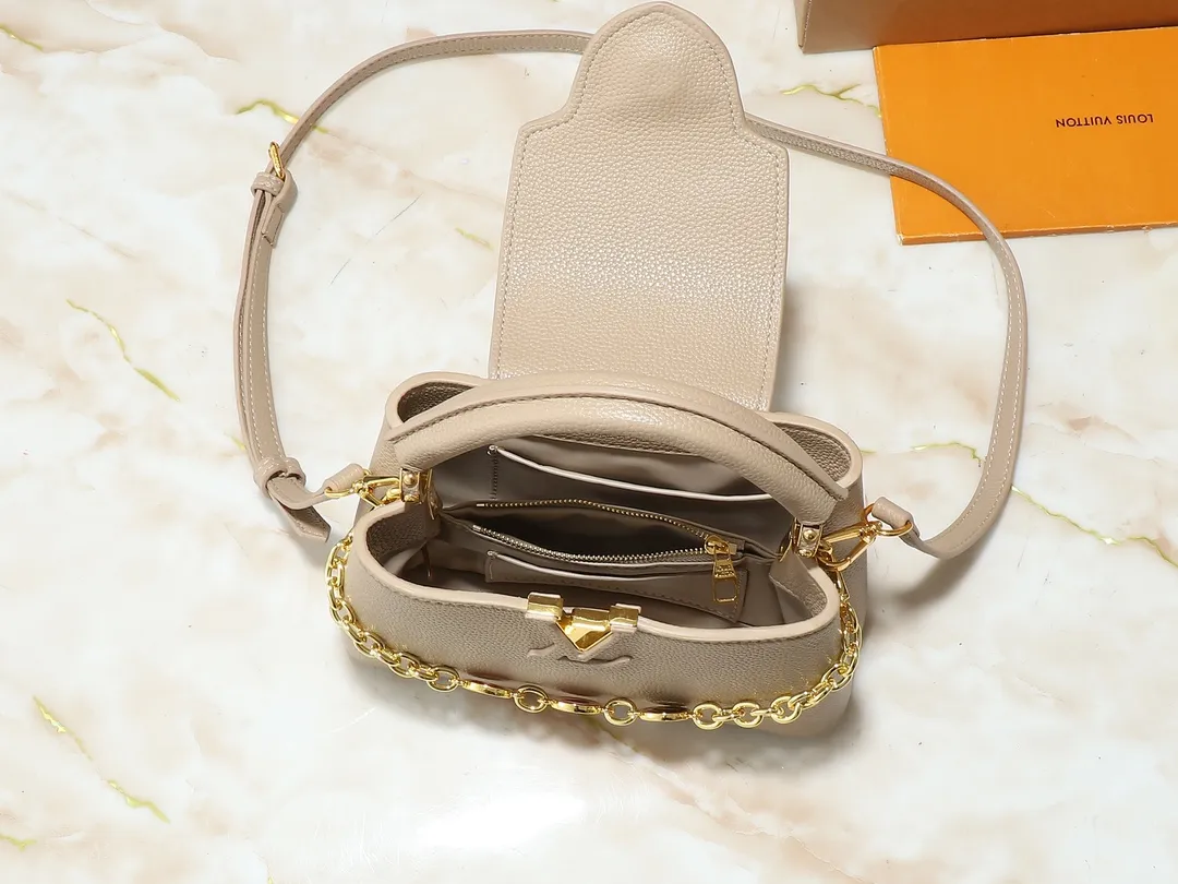 💰380💰Guangzhou goods Upgraded original M00014 M00013 M00015 [New size] This Capucines new size handbag shows soft beauty: Taurillon leather bag body with light-colored flap and top handle, enamel Monogram flower chain can also achieve a shoulder-carrying experience. Wear the slim leather strap to explore more styling possibilities. Dimensions 23.5x 14 x 8 cm (length x height x width)
