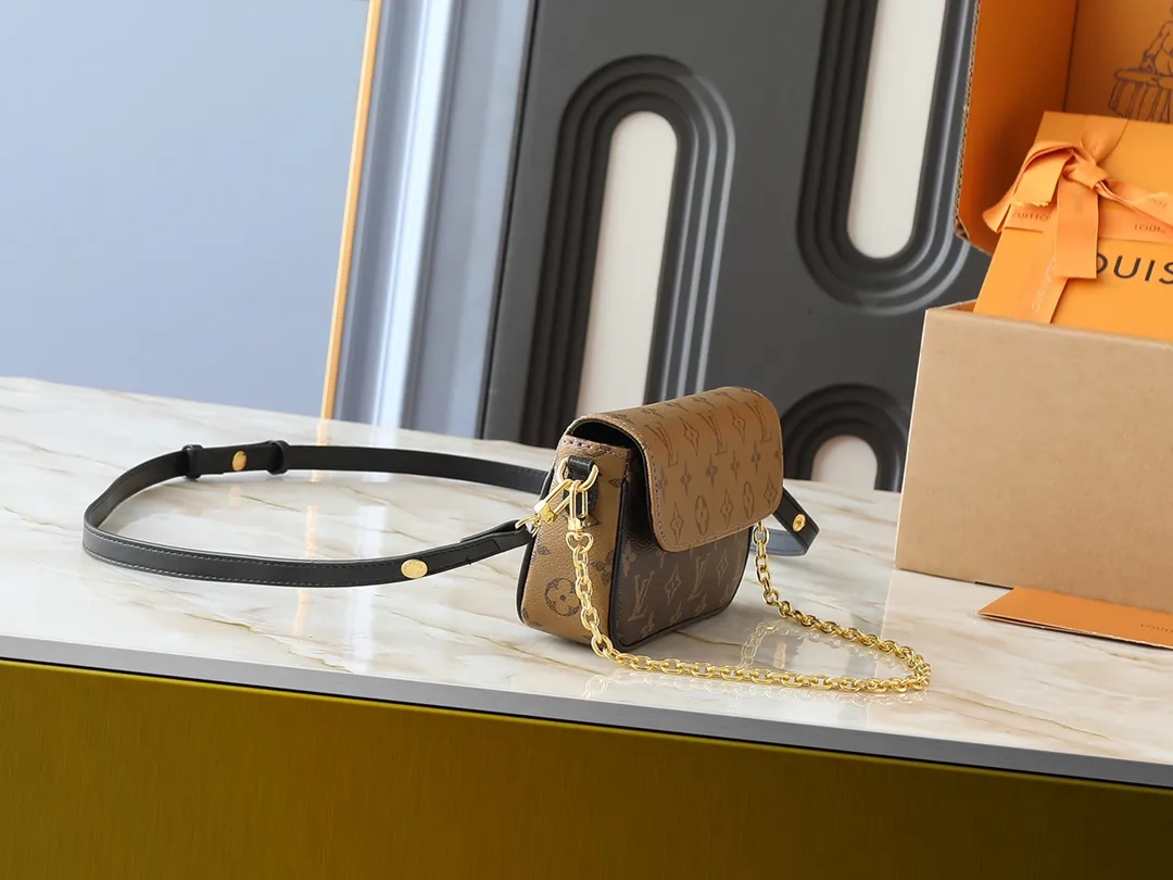 💰180💰Upgraded from the original M26587 M82211 M82210 M14225 M81911 This Wallet on Chain Ivy handbag is embossed with a large Monogram pattern on the surface of Monogram Empreinte grain leather, adding a trendy choice for daily travel and evening occasions. Cleverly using a short chain and a detachable and adjustable leather shoulder strap, it can be worn handheld, on the shoulder, or as a crossbody. Dimensions: 23.5 x 12.0 x 4.3 cm (length x height x width)
