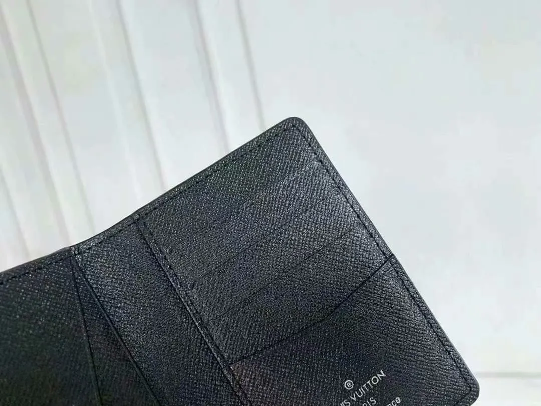 P90 Small Card Holder Louis Vuitton's pocket leather wallet has seven compartments, which can hold credit cards, bus cards, business cards, and even city maps. Damier canvas, leather-bound - two credit card compartments - four inner compartments - one outer compartment. Model M63144 Size 7X11.
