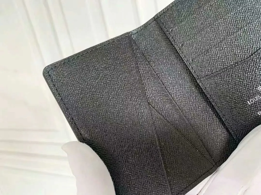 P90 Small Card Holder Louis Vuitton's pocket leather wallet has seven compartments, which can hold credit cards, bus cards, business cards, and even city maps. Damier canvas, leather-bound - two credit card compartments - four inner compartments - one outer compartment. Model M63144 Size 7X11.