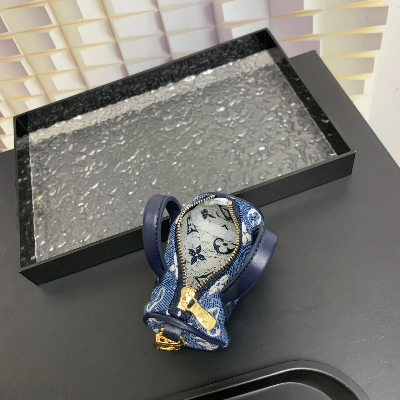💰200 shipped😍 MINI KEEPALL bag charm and keychain ☀️Louis Vuitton Louis Vuitton lv mini pillow bag pendant ☀️This Mini Keepall bag charm and keychain condenses the classic handbag configuration, boldly showing the spirit of adventure. Monogram canvas with LV inscribed hook buckle, whether hung on a belt or handbag, its zipper closure and built-in keychain ensure secure storage