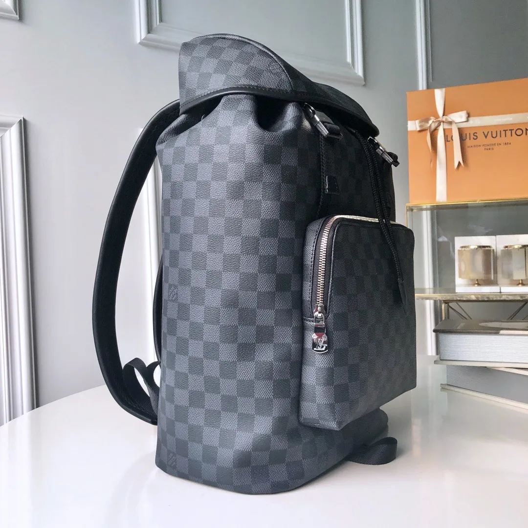💰1040 Actual photos of the top original item 😍😍 N40005 ZACK Backpack This sports-style coated canvas Zack backpack is full of capacity and shows classic Louis Vuitton style. The flap, drawstring and metal buckle are all classic Louis. Vuitton design elements. - 45 x 30 x 20cm (Length x Height x Width) - Exterior in Louis Vuitton specially coated canvas - Textile lining - Cowhide leather trim - Silver metal hardware - Top handle - 2 leather shoulder straps - Flap + drawstring + buckle - 1 lined interior compartment - 1 double interior patch pocket.