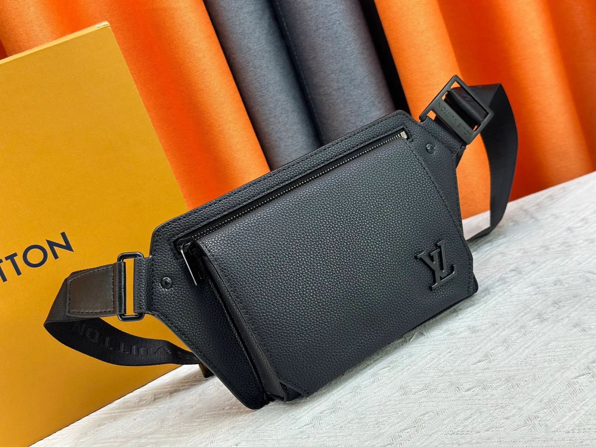 P240 M57081 The new LV Aerogram chest bag series is a minimalist and elegant style that innovates the trend. Fine calfskin, as soft as old aviation letterhead, is embellished with a matte metal LV logo. The main compartment and flap front pocket provide plenty of space for weekend trips or wandering around the city. 30x 16x 3cm (Length x Height x Width) Grained calfskin Leather trim Textile lining Metal hardware Metal lettering Customizable label Fabric shoulder strap Zip closure Flap front pocket with magnetic closure This product is made in France, Spain, Italy and the United States.