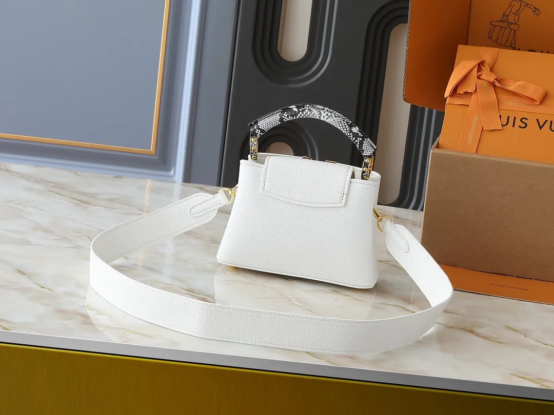 💰320💰Guangzhou goods Upgraded original M80071 M80041 M81410 M81258 M98477 This Capucines mini handbag displays the subtle sheen of the delicate Taurillon leather and python leather handles, embellished with iconic letters. The detachable wide shoulder strap allows the compact size to be worn on the shoulder or cross-body. Dimensions: 21.0 x 14.0 x 8.0 cm