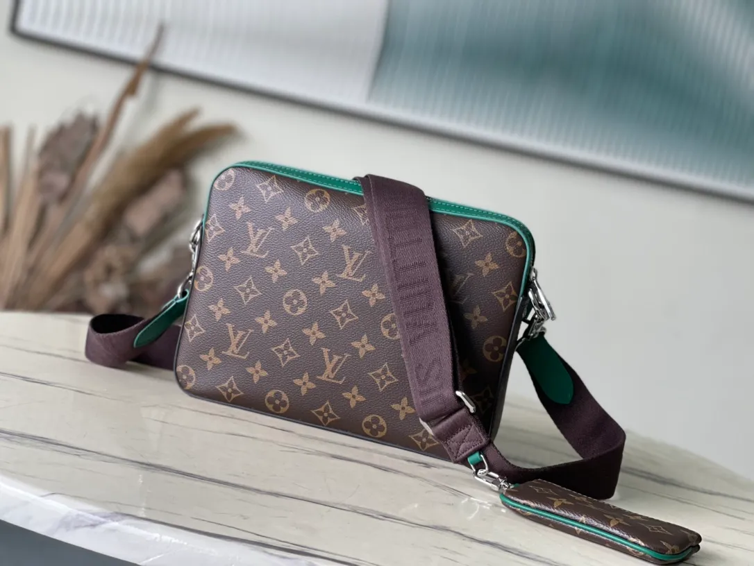 💰800 Top Original Order M12766 This Trio messenger bag is made of Monogram Macassar coated canvas, and then uses bright cow leather to outline the edges and other details. The main compartment and removable zippered front pocket provide storage, and the removable small coin purse secures via the shoulder strap's D-ring. Dimensions: 25 × 18.5 × 7cm