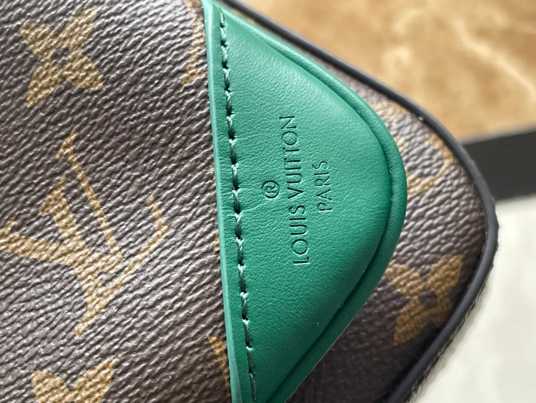 💰800 Top Original Order M12766 This Trio messenger bag is made of Monogram Macassar coated canvas, and then uses bright cow leather to outline the edges and other details. The main compartment and removable zippered front pocket provide storage, and the removable small coin purse secures via the shoulder strap's D-ring. Dimensions: 25 × 18.5 × 7cm