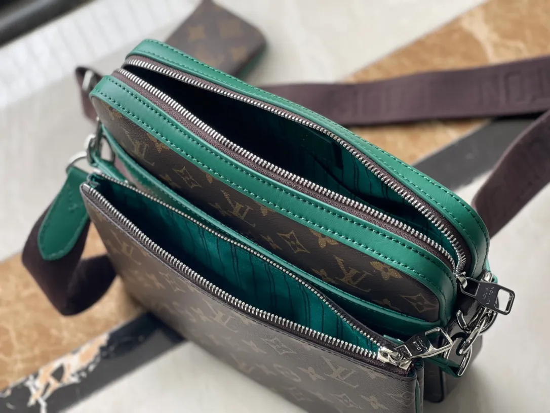 💰800 Top Original Order M12766 This Trio messenger bag is made of Monogram Macassar coated canvas, and then uses bright cow leather to outline the edges and other details. The main compartment and removable zippered front pocket provide storage, and the removable small coin purse secures via the shoulder strap's D-ring. Dimensions: 25 × 18.5 × 7cm