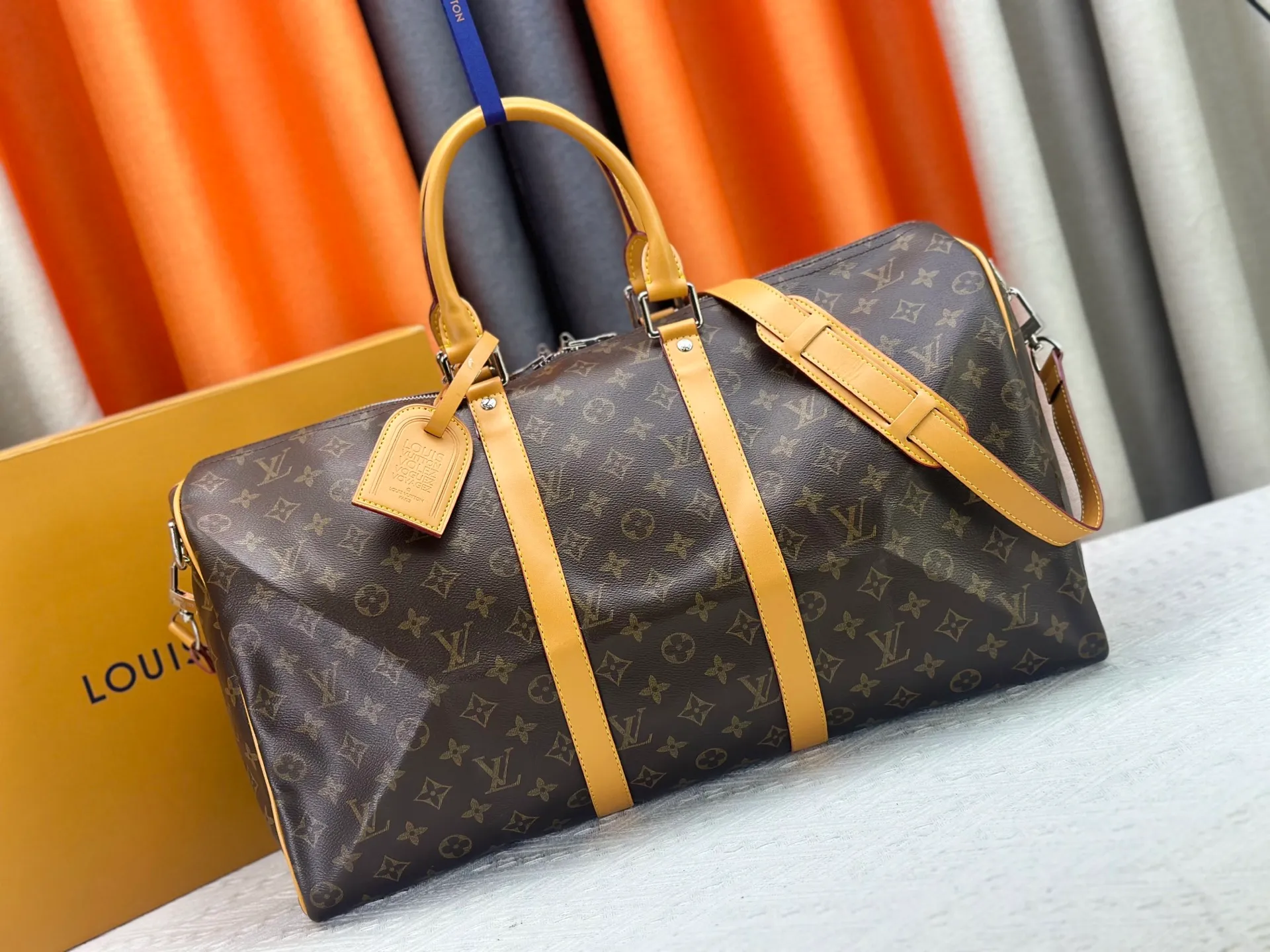 P360 Upgraded Original M41416 M12634 Yellow M12633 Dark Blue M12629 Light Blue M12630 Dark Green Top Original This Keepall Bandoulière 50 travel bag is made of Monogram Macassar canvas, which simultaneously renders bright colors for the side straps, nameplate, fabric lining and top leather handle. The size of your carry-on luggage hides plenty of space. 50.0 x 29.0 x 23.0 cm (L x H x W) • Monogram Macassar coated canvas • Cow leather trim • Textile lining • Metal hardware • Carry-on dimensions • Double zipper closure • Padlock • Removable name tag • Internal zip pocket • Shoulder strap: removable, adjustable • Half-length strap: 36.0 cm • Half-length strap adjustable to: 50.0 cm • Handle: Double handle