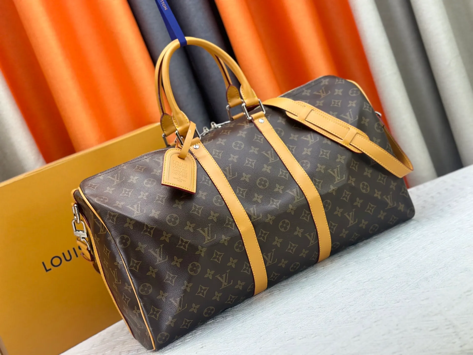 P360 Upgraded Original M41416 M12634 Yellow M12633 Dark Blue M12629 Light Blue M12630 Dark Green Top Original This Keepall Bandoulière 50 travel bag is made of Monogram Macassar canvas, which simultaneously renders bright colors for the side straps, nameplate, fabric lining and top leather handle. The size of your carry-on luggage hides plenty of space. 50.0 x 29.0 x 23.0 cm (L x H x W) • Monogram Macassar coated canvas • Cow leather trim • Textile lining • Metal hardware • Carry-on dimensions • Double zipper closure • Padlock • Removable name tag • Internal zip pocket • Shoulder strap: removable, adjustable • Half-length strap: 36.0 cm • Half-length strap adjustable to: 50.0 cm • Handle: Double handle