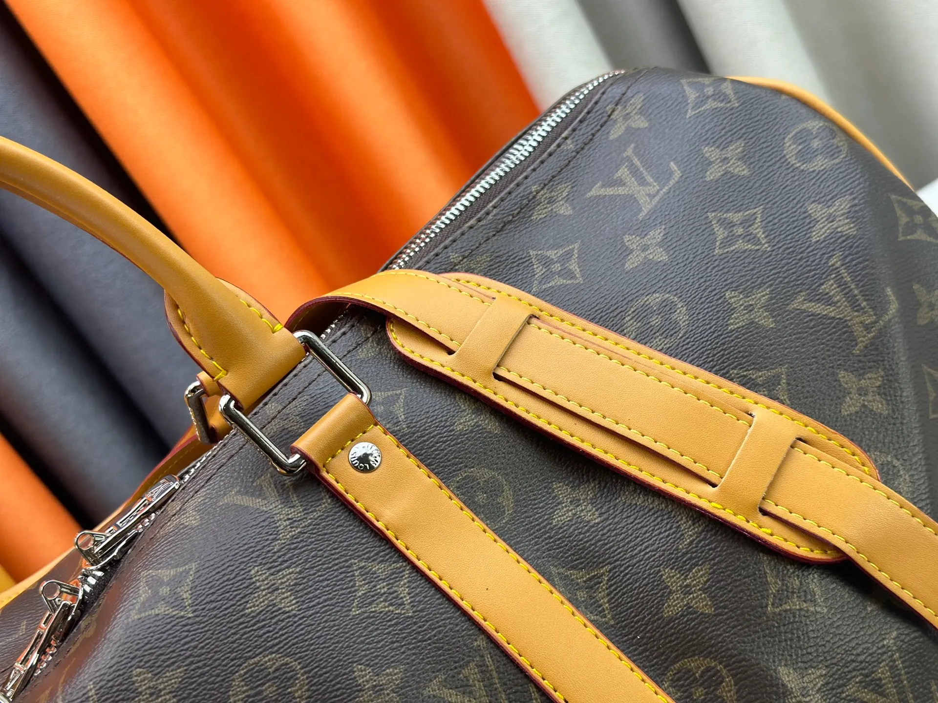 P360 Upgraded Original M41416 M12634 Yellow M12633 Dark Blue M12629 Light Blue M12630 Dark Green Top Original This Keepall Bandoulière 50 travel bag is made of Monogram Macassar canvas, which simultaneously renders bright colors for the side straps, nameplate, fabric lining and top leather handle. The size of your carry-on luggage hides plenty of space. 50.0 x 29.0 x 23.0 cm (L x H x W) • Monogram Macassar coated canvas • Cow leather trim • Textile lining • Metal hardware • Carry-on dimensions • Double zipper closure • Padlock • Removable name tag • Internal zip pocket • Shoulder strap: removable, adjustable • Half-length strap: 36.0 cm • Half-length strap adjustable to: 50.0 cm • Handle: Double handle