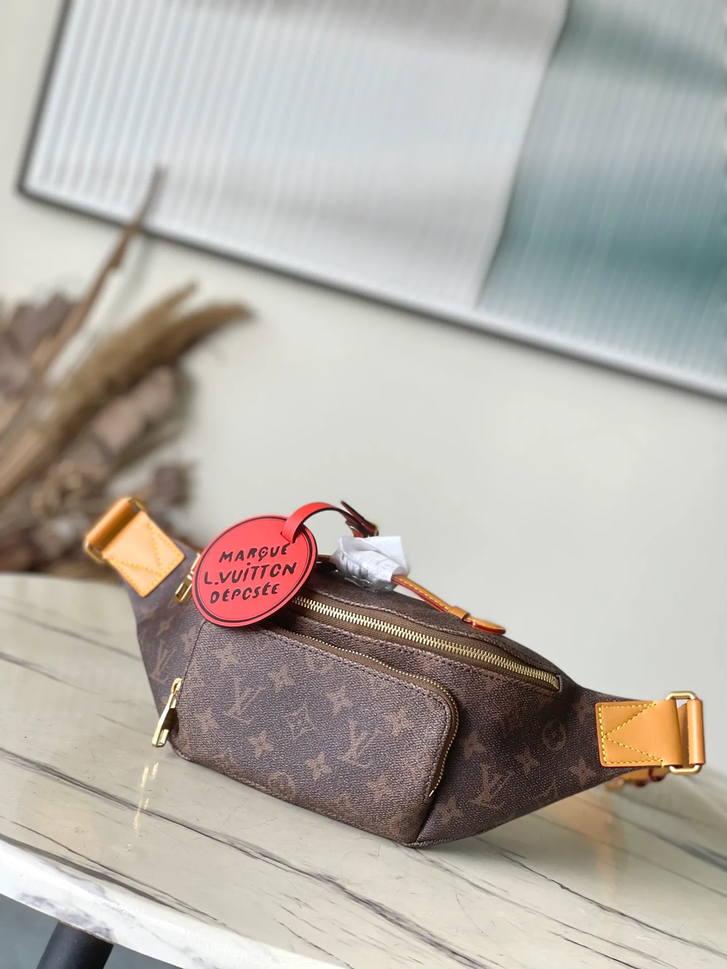 💰980 Top Original Order M11539 This Rush waist bag is made of Monogram Dust canvas to create a retro trompe l'oeil effect. It is equipped with double zippers for convenient access to the main compartment. The elegant decoration expresses the Marque L.Vuitton Deposee logo. Dimensions: 30 × 15 × 8 cm